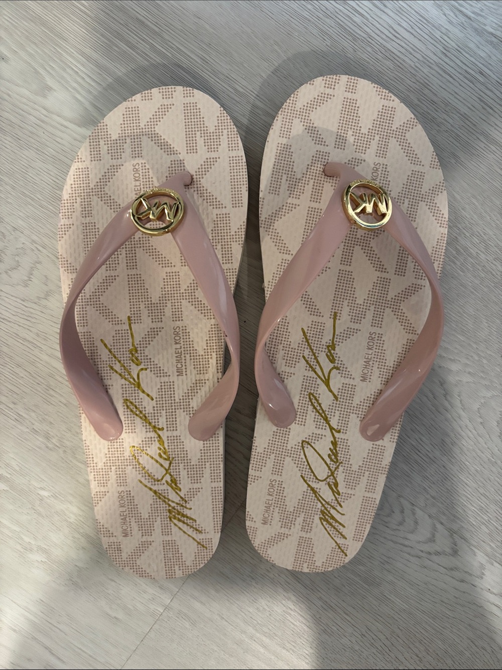 Michael Kors Pink Logo Jelly Flip Sandals with Gold Emblem
